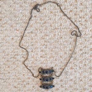 Antique looking deep blue sapphire necklace.